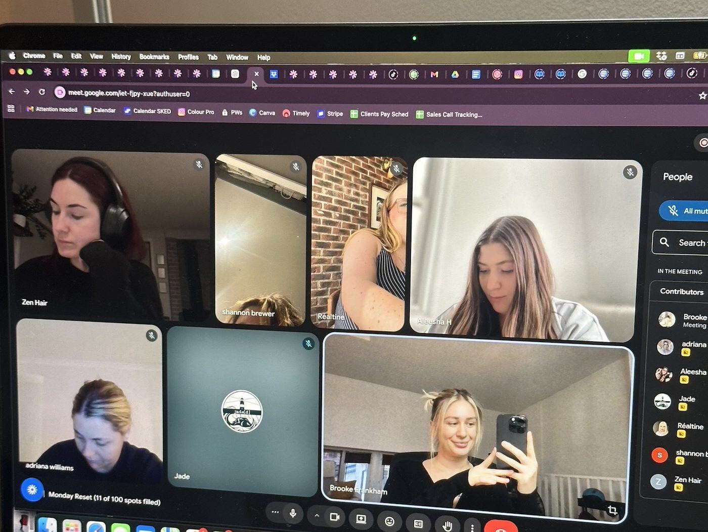 Brooke teaching a room of stylists in a salon