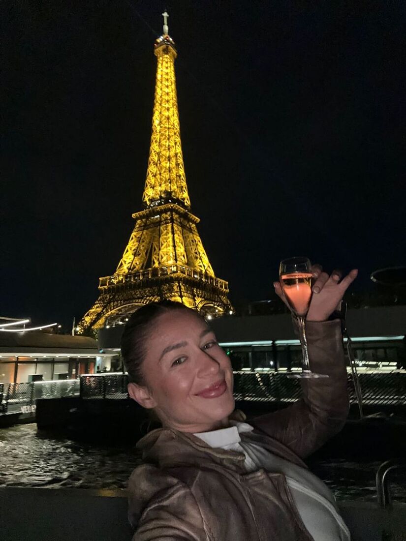 Brooke by the Eiffel Tower at night